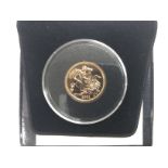 A 2021 uncirculated gold sovereign. Shipping categ