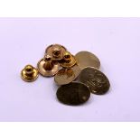 A 9ct gold studs and cuff link set. Weight 9.3g to