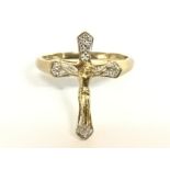 9ct gold cross ring set with white stones. Size V