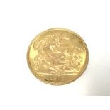 A 1912 gold half sovereign. Postage A