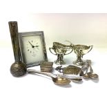 A mixed lot of silver and hallmarked silver items