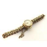 9ct Accurist gold ladies watch approximately 14g.