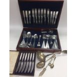 A cased cutlery set, cased butter knives and other cutlery etc. Shipping category D.