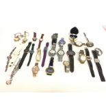 A collection of dress watches including some beads