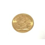 A 1910 gold full sovereign. Postage A