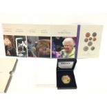 A 2021 uncirculated UK coin set and a gold plated