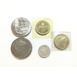 2 x £5 coins 2 x £2 and a silver £1 coin. Postage