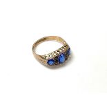 A vintage 9ct gold and stone set ring. (A).