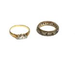 Two Edwardian rings. An 18ct gold diamond set ring