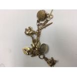 A 9 ct gold charm bracelet total weight 8 grams