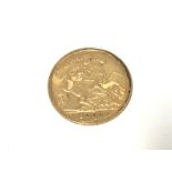 A 1906 gold half sovereign. Postage A