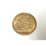 A 1910 gold half sovereign. Postage A