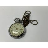 An Ingersoll pocket watch. Postage category A.