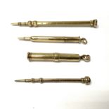5 antique gold propelling pencils to include 2 S.M