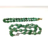 2 faceted low grade faceted emerald necklaces one