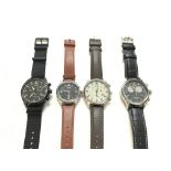 A collection of four Timex watches. First two seen