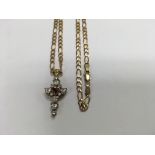 A 9 ct gold chain 6.5 grams with attached cross ge