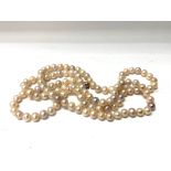 A cultured pearl Longaurd approx 58cm, 5mm diamete