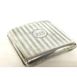 A silver hallmarked cigarette case, postage cat A