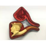 A cased Meerschaum and amber pipe. Shipping catego