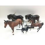Five ceramic figures of horses including Beswick a
