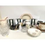 A collection of various ceramics including resin a