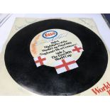 A Esso 1970 World Cup record with signatures . Together with football club badges,
