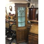 A yew wood corner cabinet, approx height 184cm. Shipping category D.