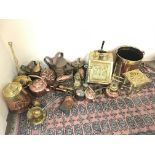 A large collection of brass and copper ware includ
