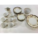 A Noritake tea set. There is damage to three of th