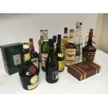 A collection of wines and spirits including a ten