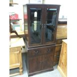 An inlaid mahogany cabinet, approx height 146cm. Shipping category D.