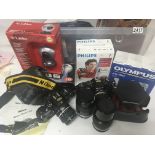 A quantity of camera equipment including two Nikon