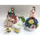 Five ceramic figures of ladies comprising Doulton