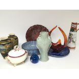 A collection of ceramics and a simulated cinnabar