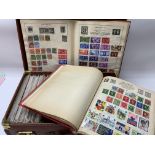 A case of stamp albums and first day covers. (D)