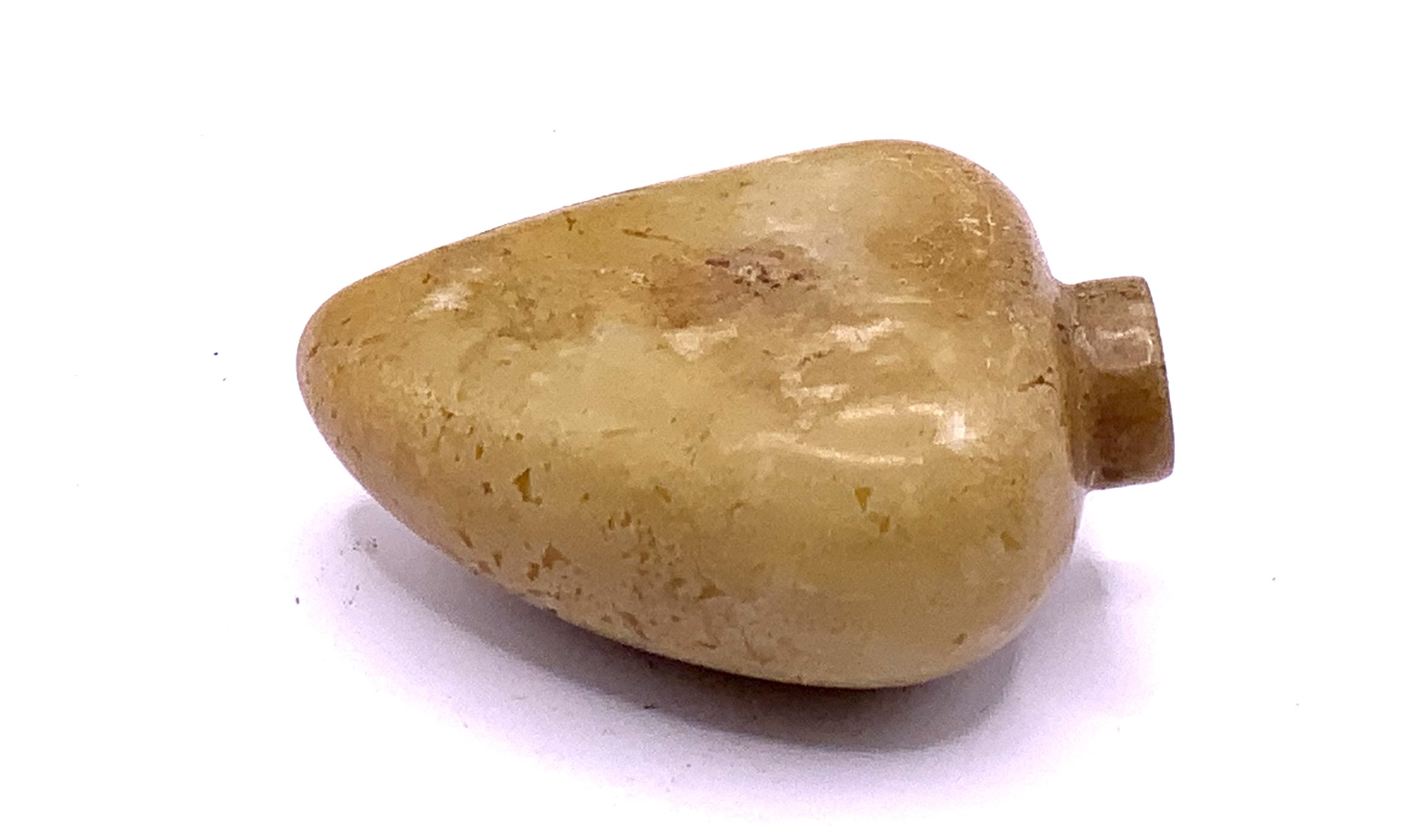 A 19thC polished nephrite pebble snuff bottle. 5.5 - Image 2 of 2