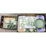 Two boxes of green wedgwood including vases, lidde
