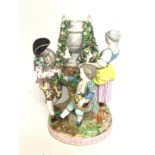 Porcelain Dresden figure scene, with floral decora