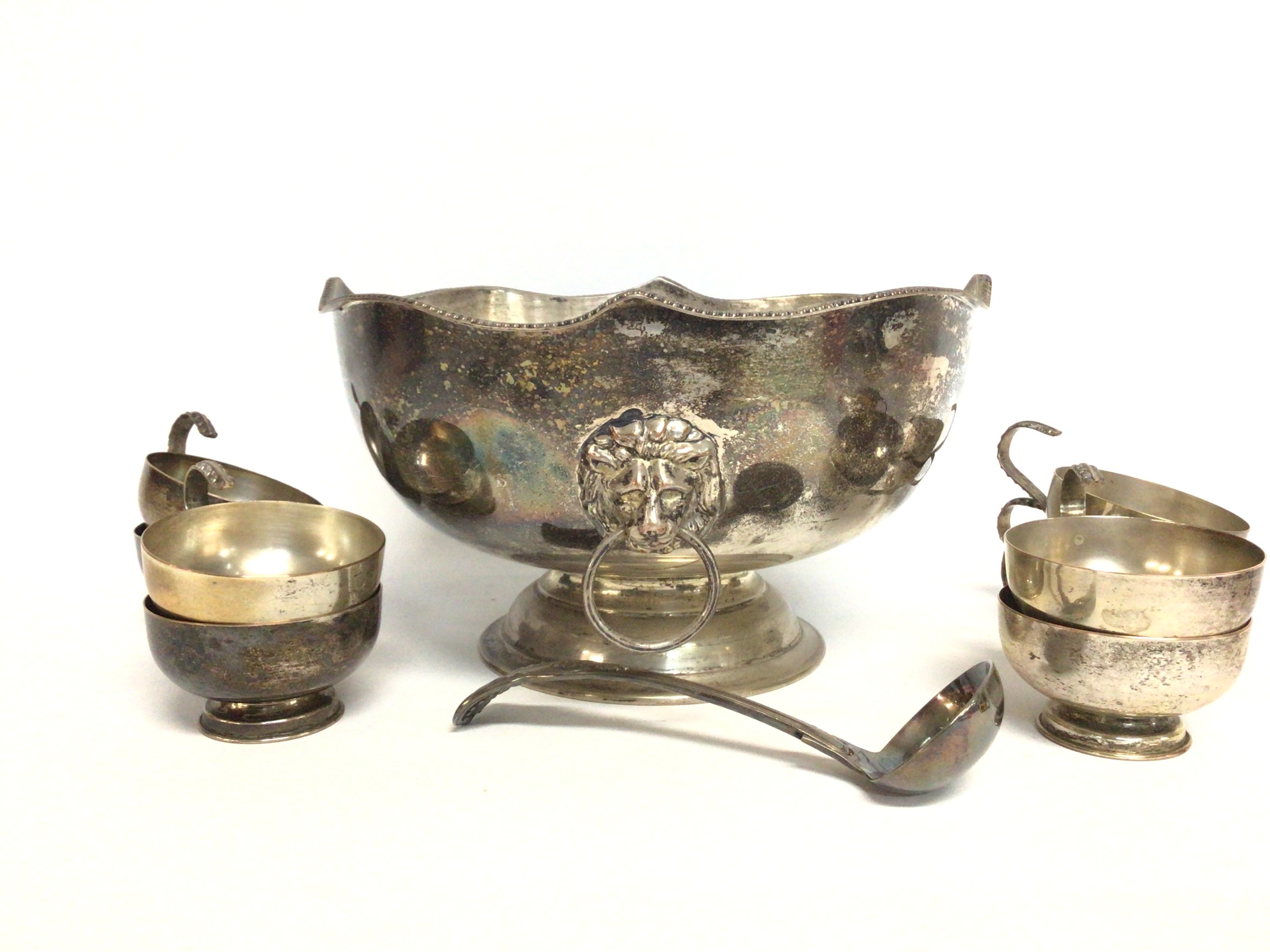 A collection of silver plate including a punch bow