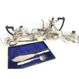 Silver plated tea set and a 3 piece Garrards silve
