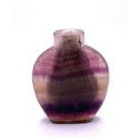 A 19thC banded amethyst snuff bottle, 7.5cm, with