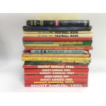 A collection of vintage football annuals and books