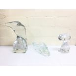 Three lead crystal paper weights, including Snoopy
