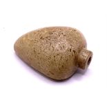 A 19thC polished nephrite pebble snuff bottle. 5.5