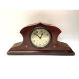 A mahogany mantle clock with art nouveau painted d