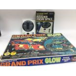 A boxed battery operated Grand Prix Glow racing ga