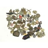 A collection of militia badge caps including Briti