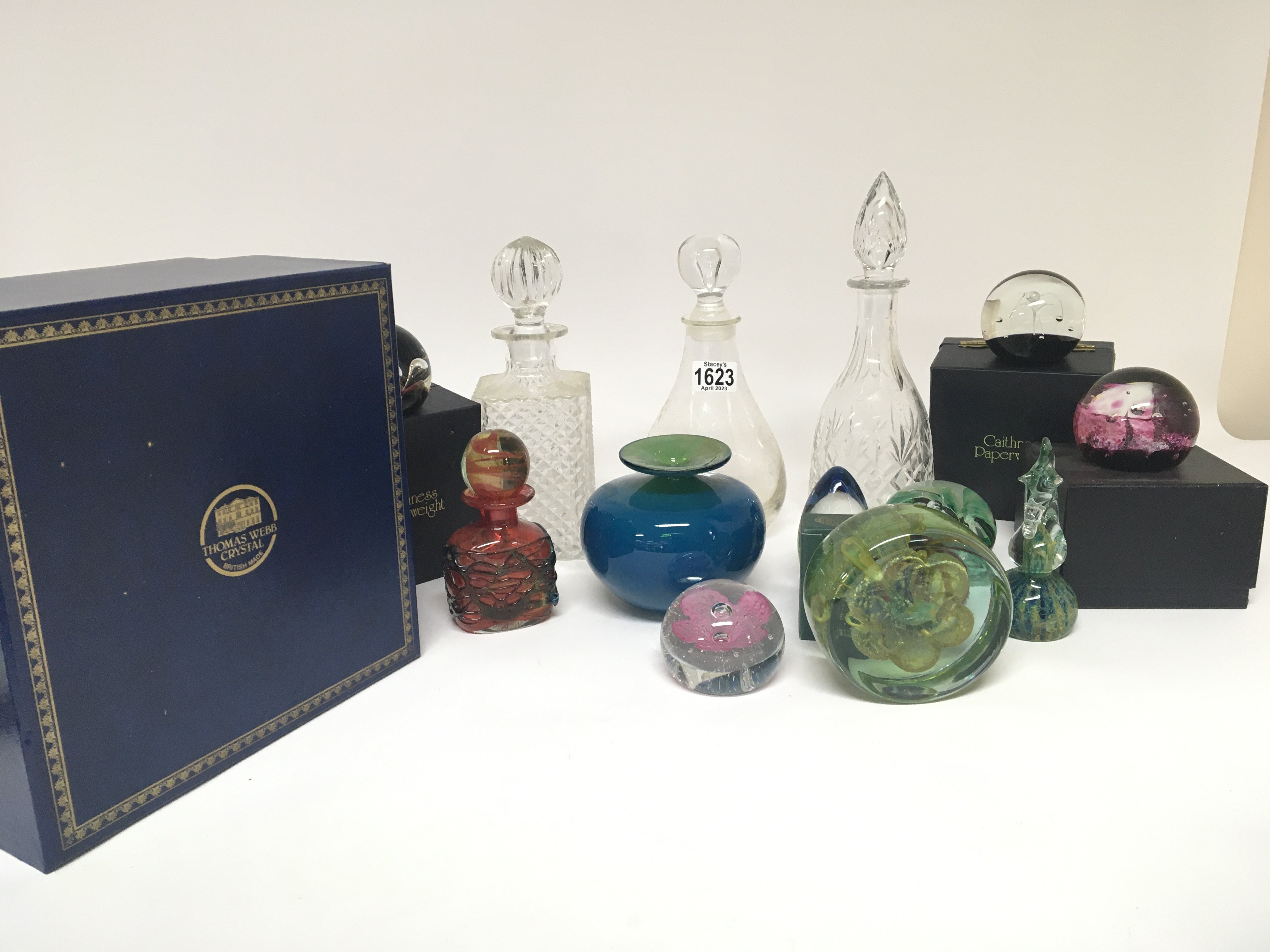 A collection of Caithness and other glass paperwei