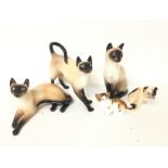 Royal Doulton ceramic cats and a Doulton bulldog